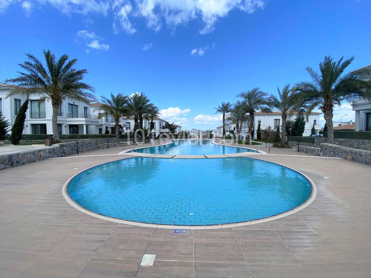 TOP FLOOR APARTMENT IN TOWN HOUSES, THE MOST PRESTIGIOUS SITE OF ALSANCAK IN KYRENIA, CYPRUS ** 