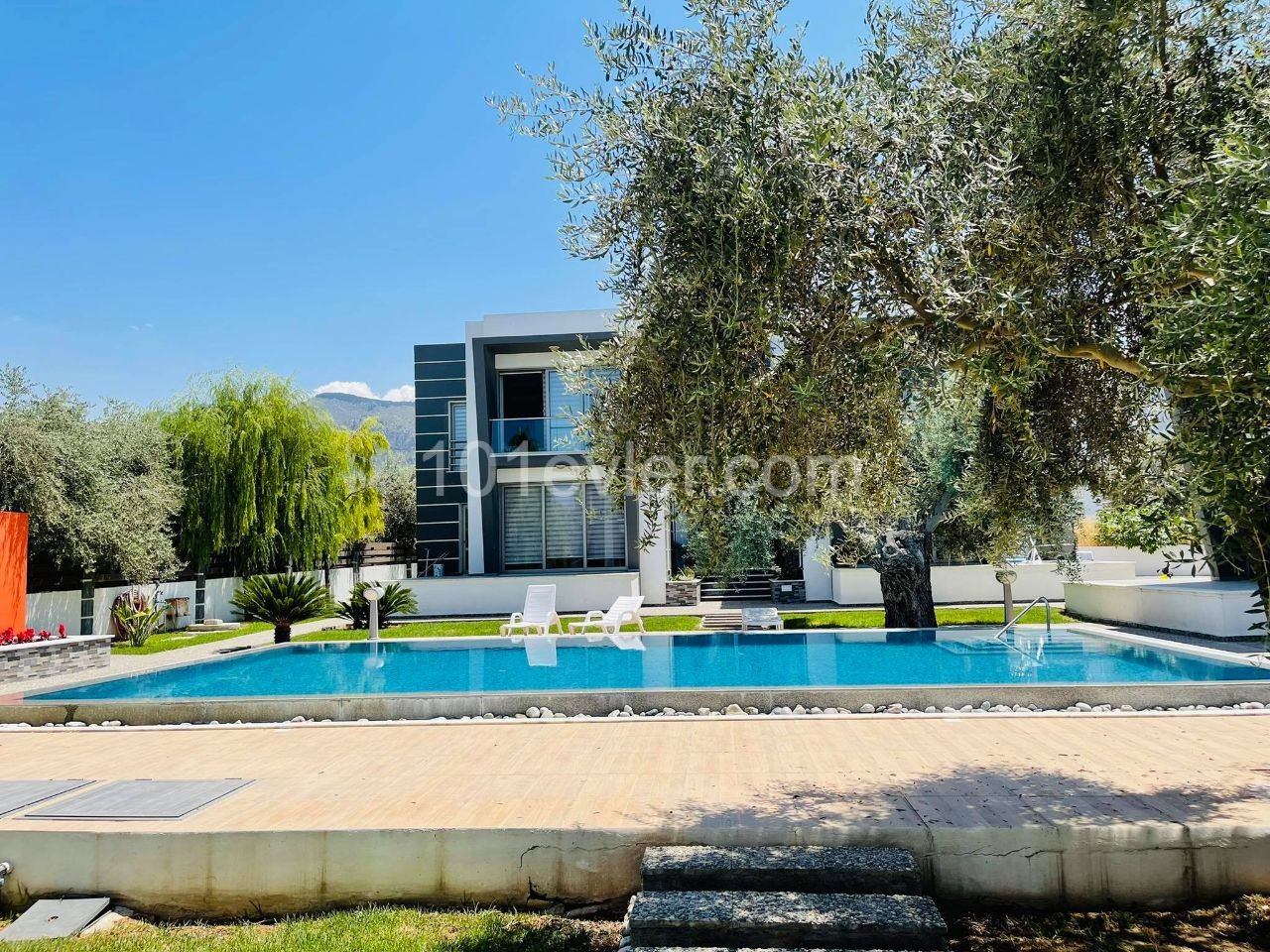 NEWLY FURNISHED GARDEN AND TOP FLOOR APARTMENTS ON A SITE WITH A POOL NEAR THE MAIN STREET IN KYRENIA OZANKOY ** 