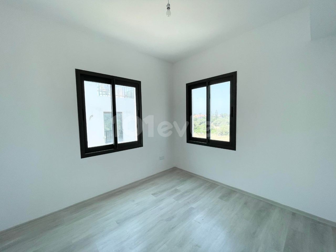 TOP FLOOR APARTMENT WITH 2 + 1 PRIVATE TERRACE WITH AN OPPORTUNITY PRICE OF 100 M2 IN KYRENIA OLIVE GROVE, CYPRUS ** 