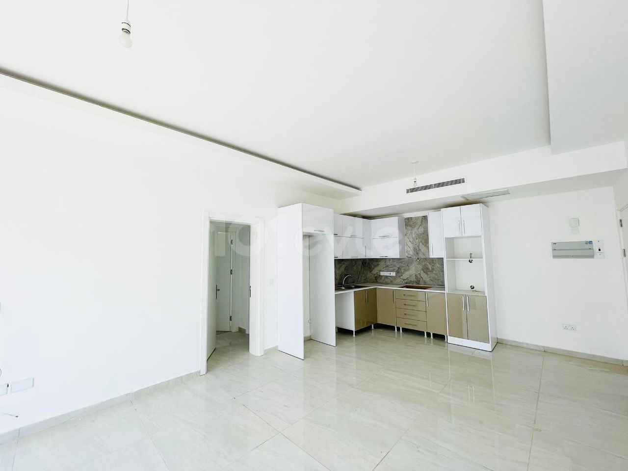 TOP FLOOR APARTMENT WITH 2 + 1 PRIVATE TERRACE WITH AN OPPORTUNITY PRICE OF 100 M2 IN KYRENIA OLIVE GROVE, CYPRUS ** 