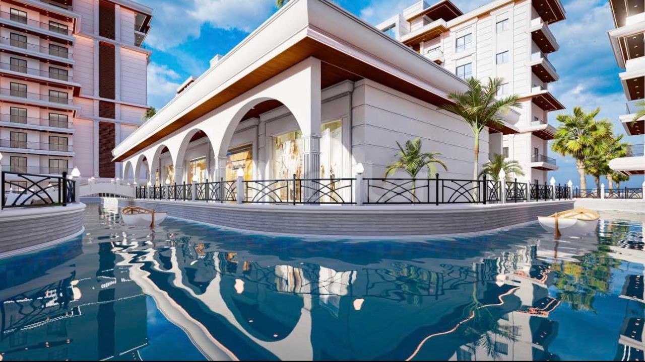 A Magnificent Life with Rental Guarantee Begins in Cyprus Iskele Long Beach 1+1 Apartments for Sale