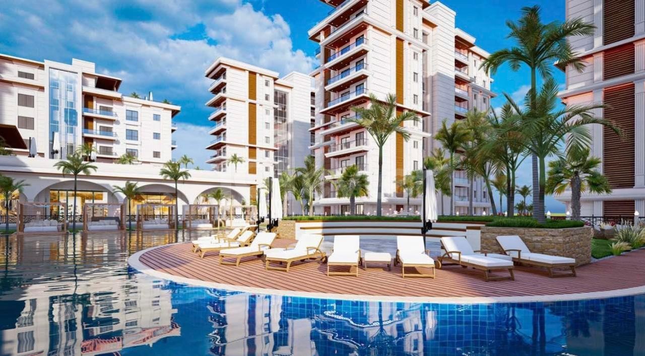 A Magnificent Life with Rental Guarantee Begins in Cyprus Iskele Long Beach 1+1 Apartments for Sale