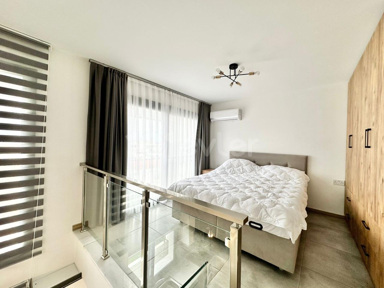 Полностью новая меблированная квартира-лофт 1+1 в аренду в районе Кирения Алсанджак