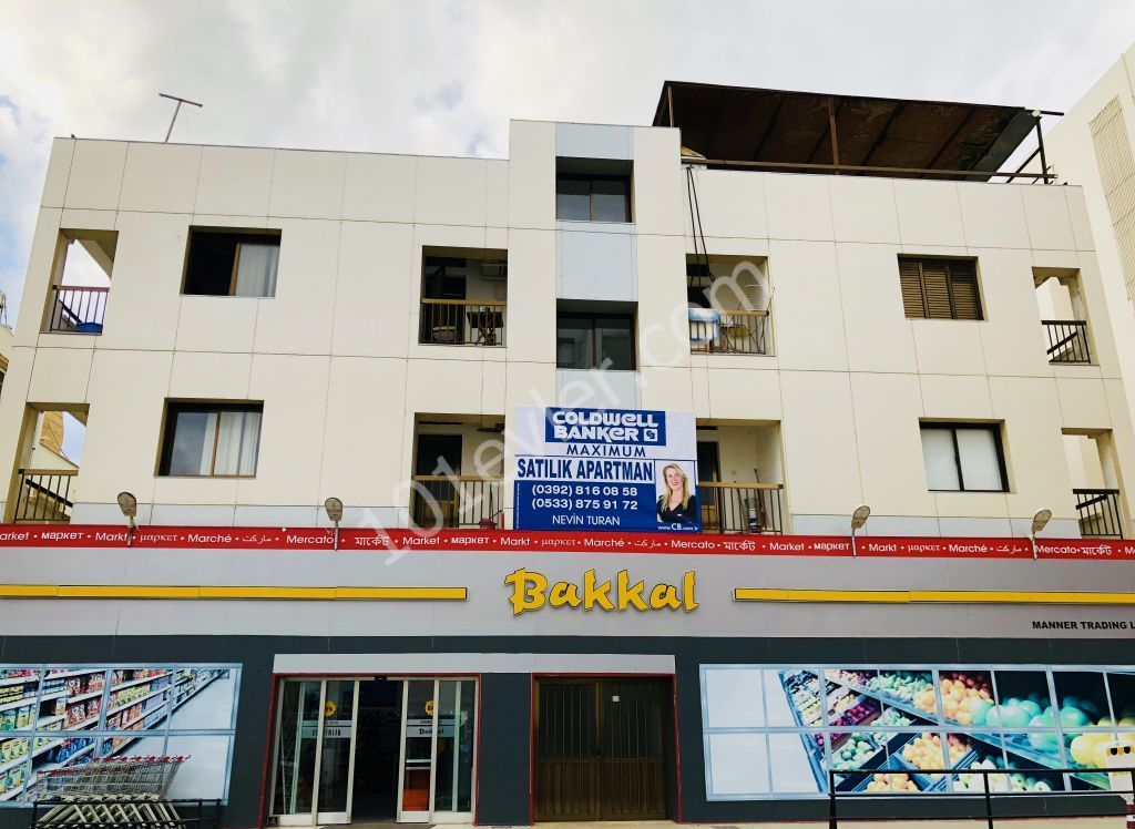 GİRNE MERKEZ DE , KIYMETLİ DÜKKANI DA OLAN  SATILIK APARTMAN