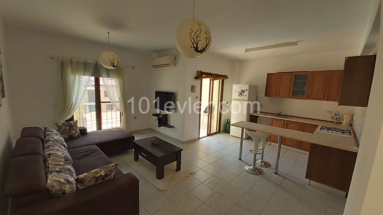 Two-bedroom furnished penthouse for sale  in Doanköy, Girne in a complex with a swimming pool