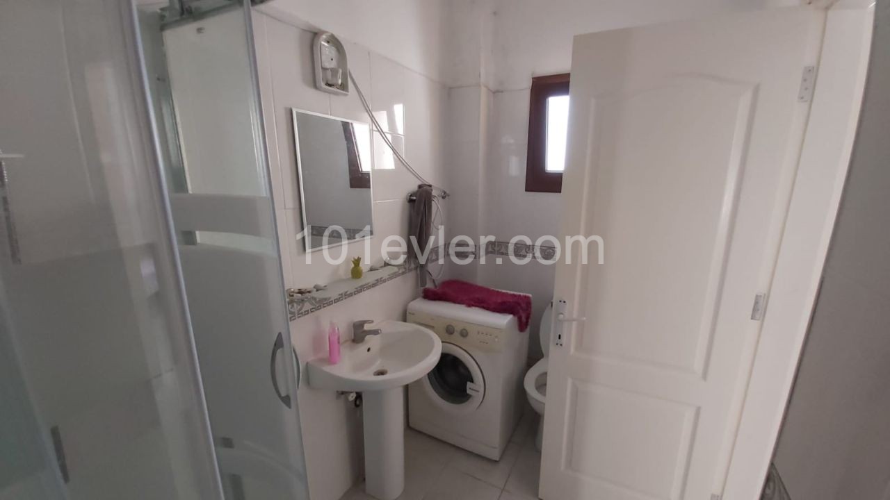 Two-bedroom furnished penthouse for sale  in Doanköy, Girne in a complex with a swimming pool