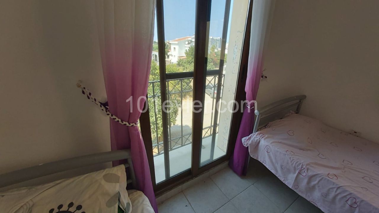 Two-bedroom furnished penthouse for sale  in Doanköy, Girne in a complex with a swimming pool