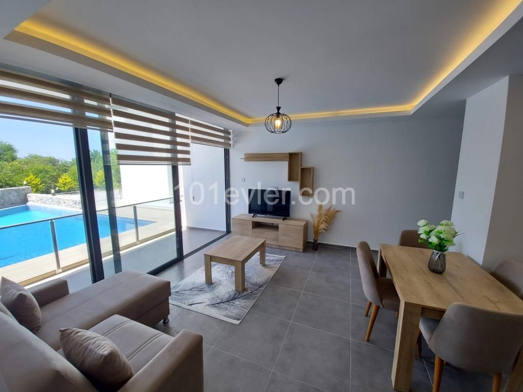 2+1 penthouse or garden apartment for sale in a complex with pool in Lapta area, Girne.