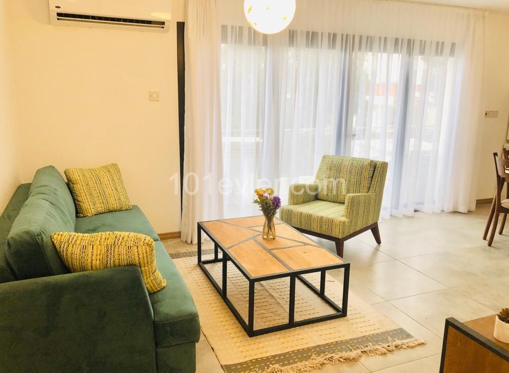 1+1 Luxury apartment with garden for rent in Alsancak, in a complex with pool