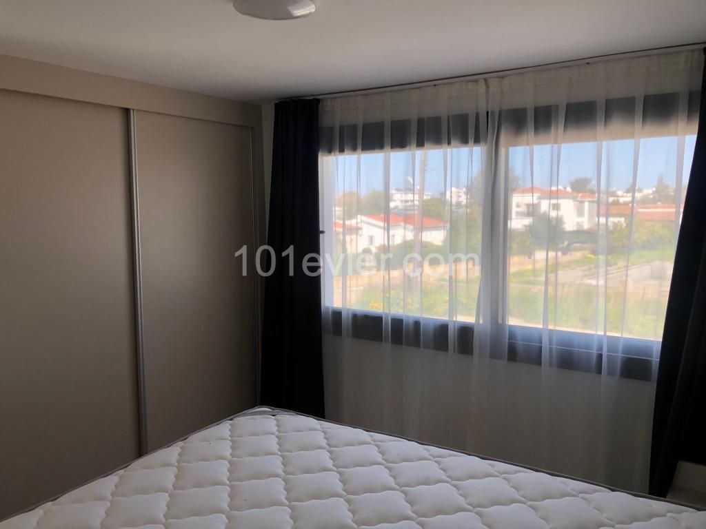 2+1 luxury loft flat for rent in Alsancak, in a complex with a pool.