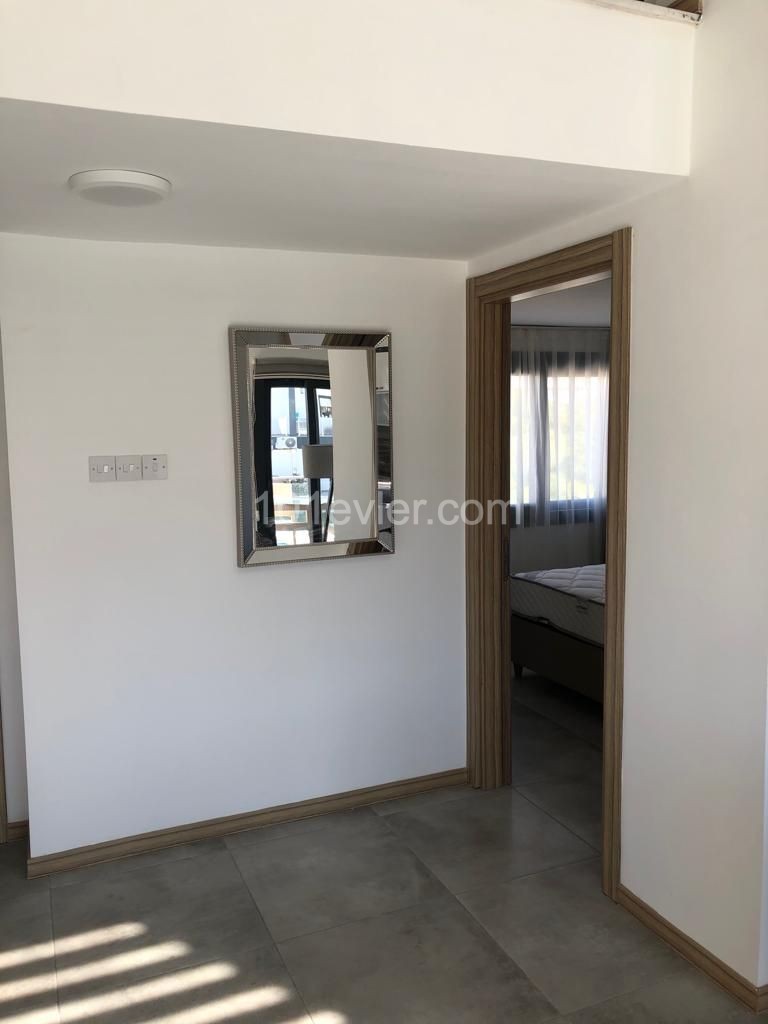 2+1 luxury loft flat for rent in Alsancak, in a complex with a pool.