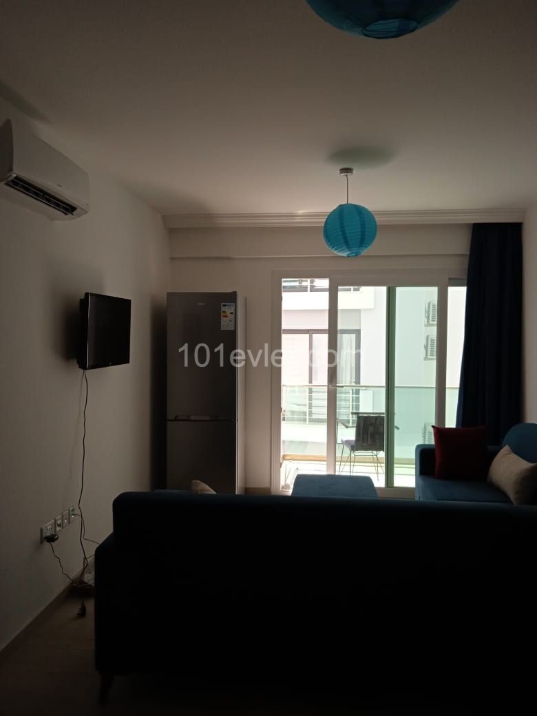 2+1 fully furnished apartment for sale in the residence with pool, in the center of Kyrenia.