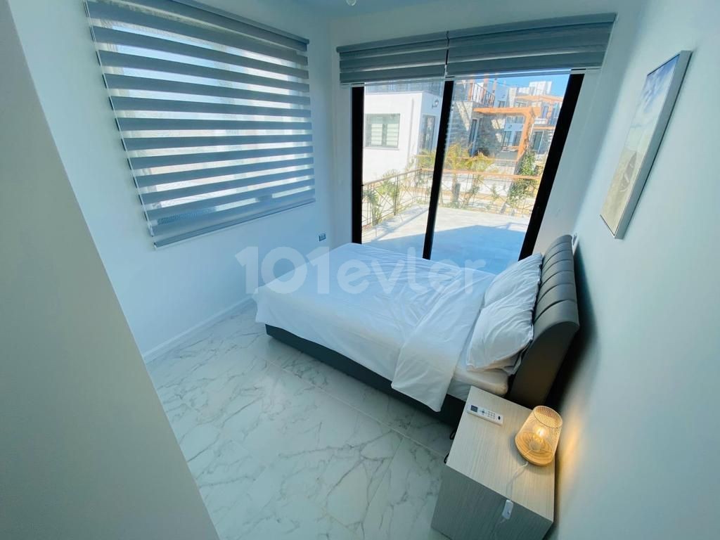 Luxury 3+1 apartment with garden for sale in Esentepe