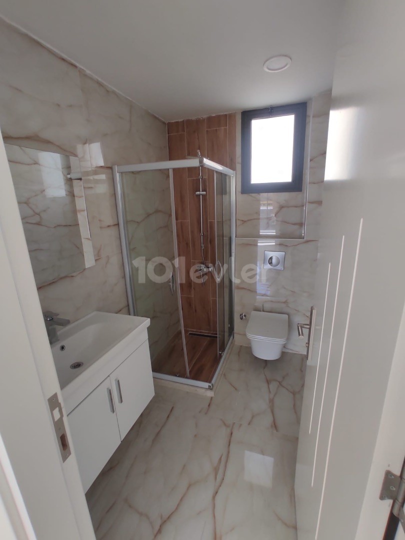 NEW 2+1 flat for sale in Alsancak in beautiful site with swimming pool