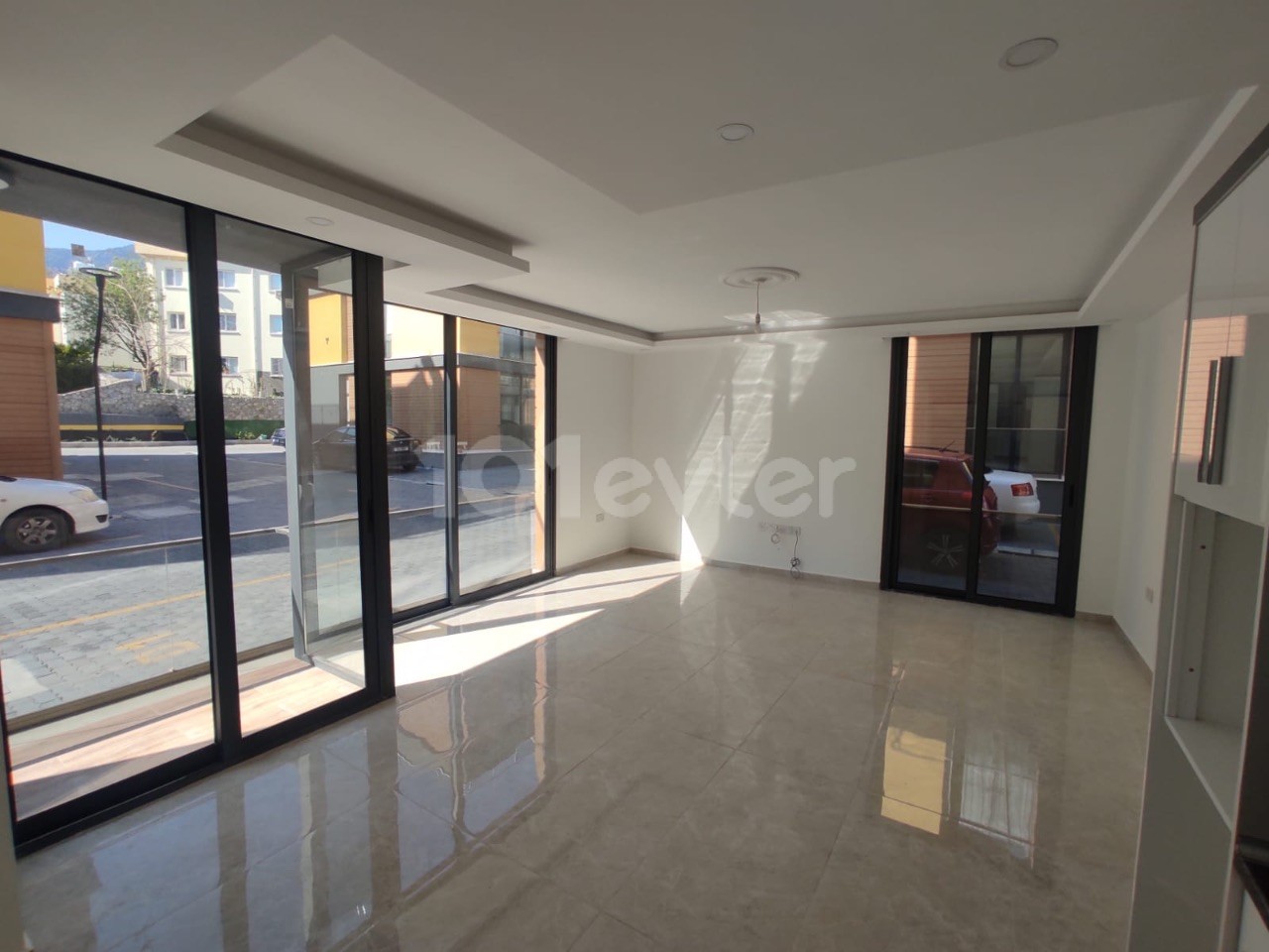 NEW 2+1 flat for sale in Alsancak in beautiful site with swimming pool