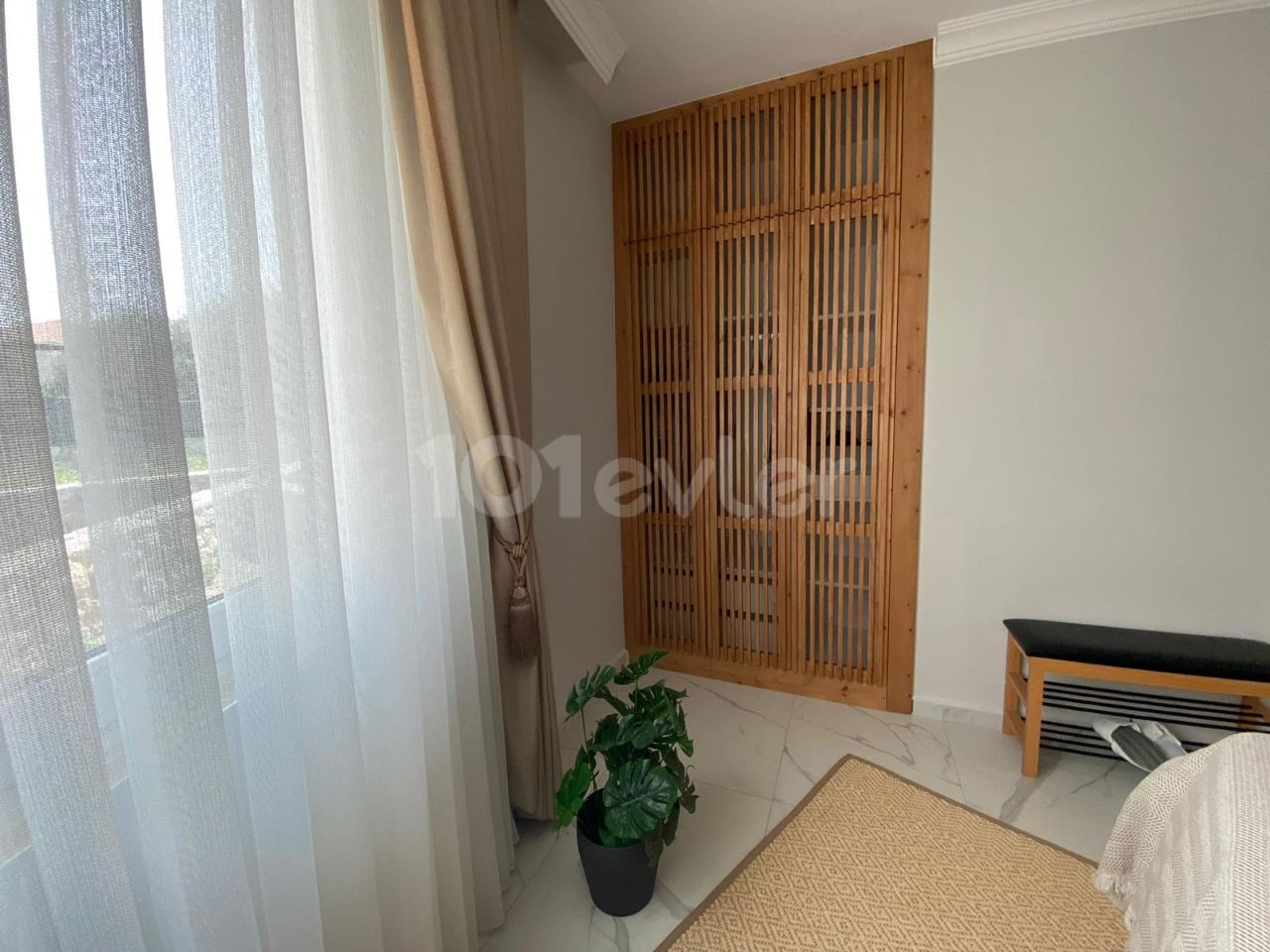 1+1 apartment for sale in Karaoğlanoğlu with garden 