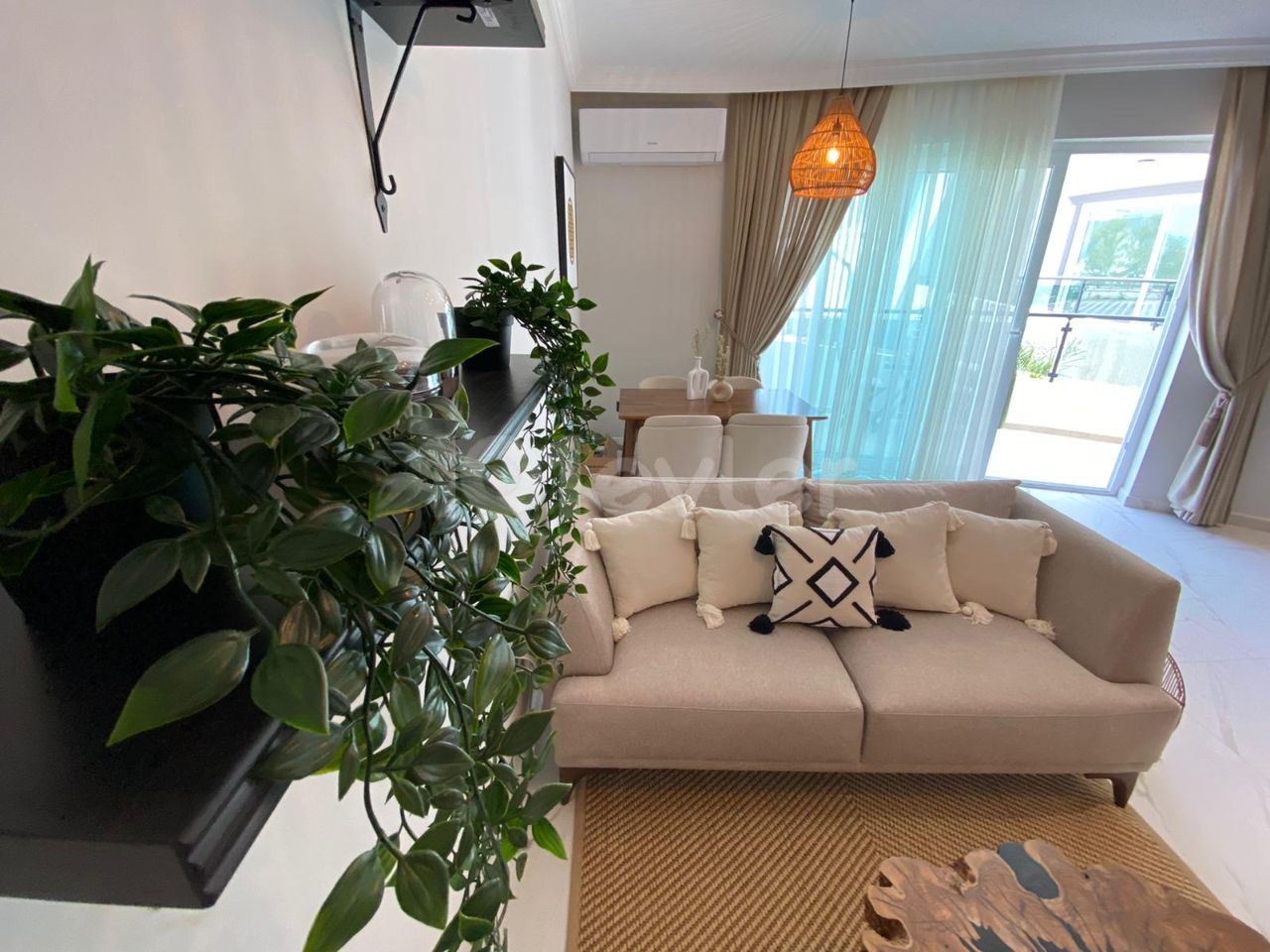 1+1 apartment for sale in Karaoğlanoğlu with garden 