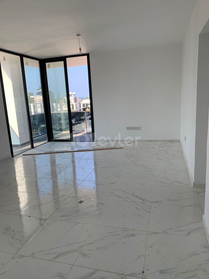 2+1 apartments, ground floor and penthouse for sale in Ozankoy