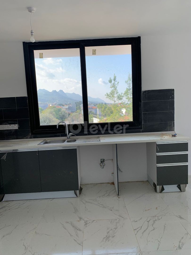 2+1 apartments, ground floor and penthouse for sale in Ozankoy