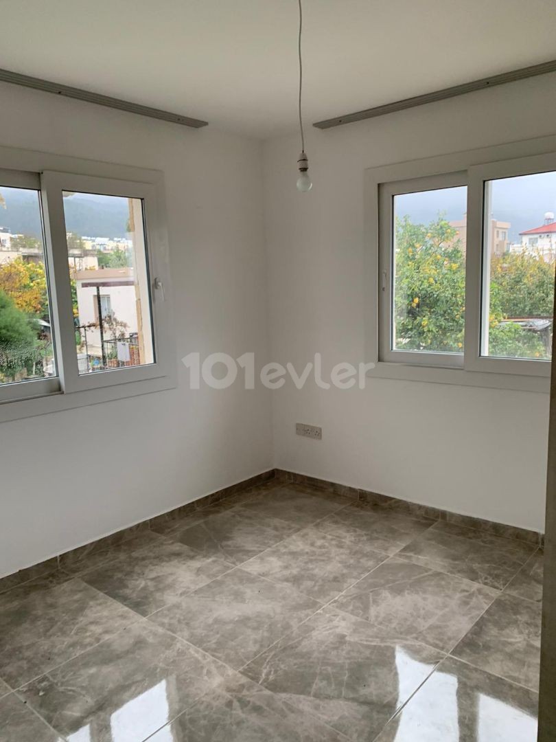 3+1 ground floor apartment with garden for sale in Alsancak