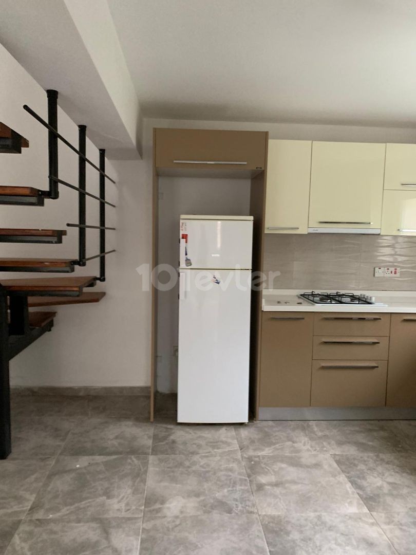 3+1 ground floor apartment with garden for sale in Alsancak