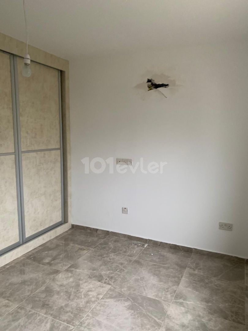 3+1 ground floor apartment with garden for sale in Alsancak