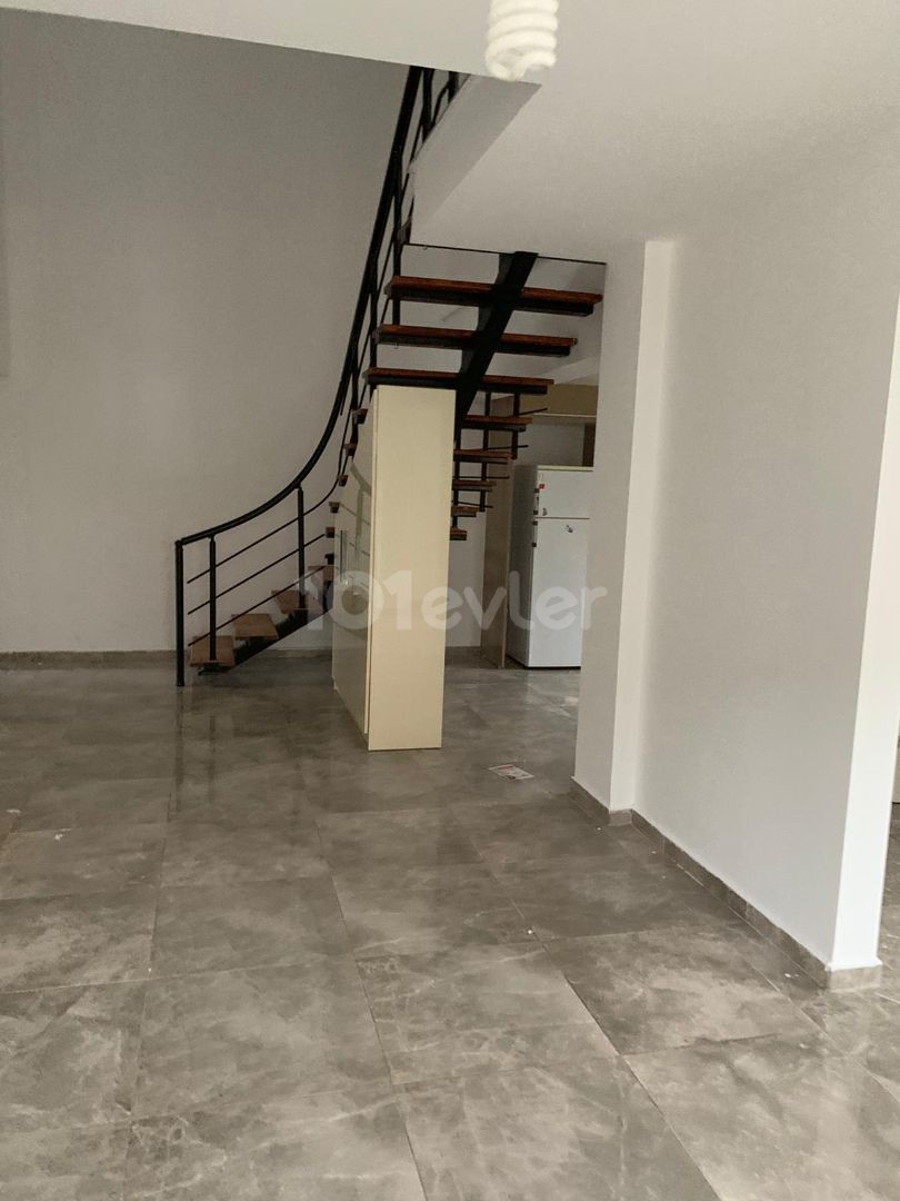 3+1 ground floor apartment with garden for sale in Alsancak