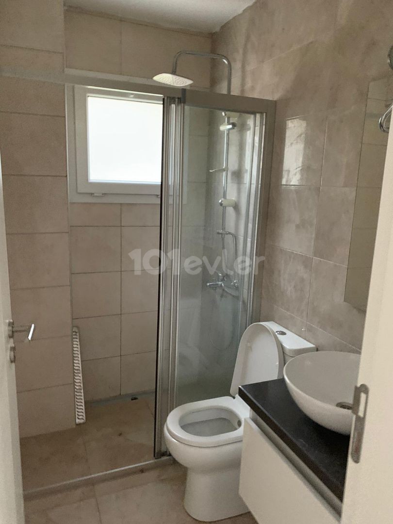 3+1 ground floor apartment with garden for sale in Alsancak