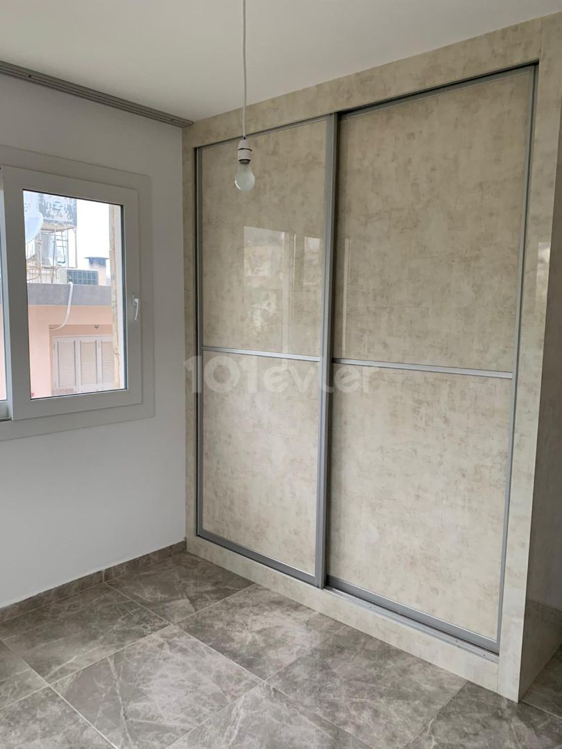 3+1 ground floor apartment with garden for sale in Alsancak