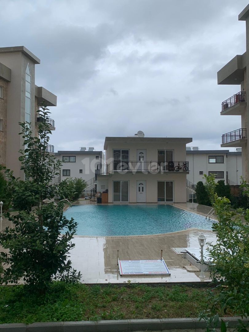 3+1 ground floor apartment with garden for sale in Alsancak