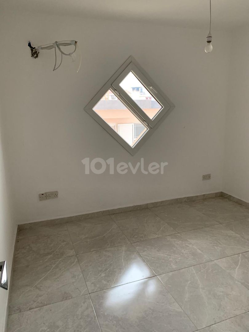 3+1 ground floor apartment with garden for sale in Alsancak