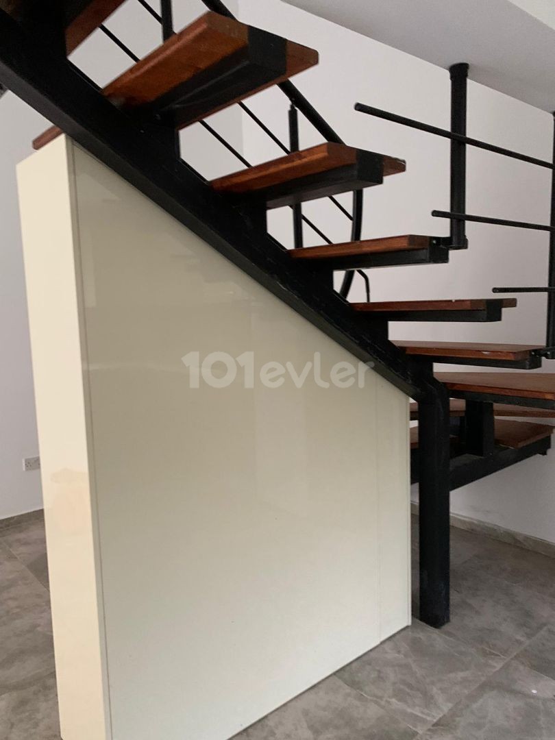 3+1 ground floor apartment with garden for sale in Alsancak