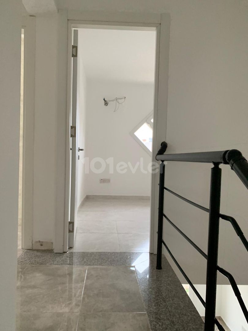 3+1 ground floor apartment with garden for sale in Alsancak