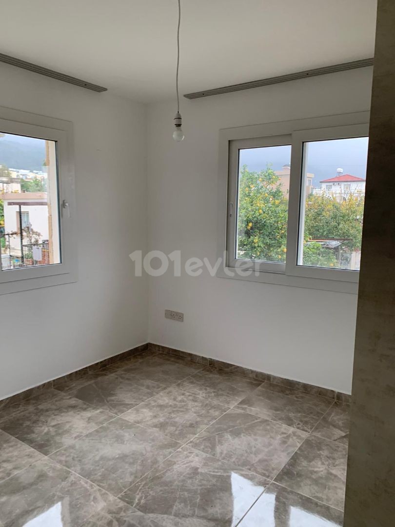 3+1 ground floor apartment with garden for sale in Alsancak