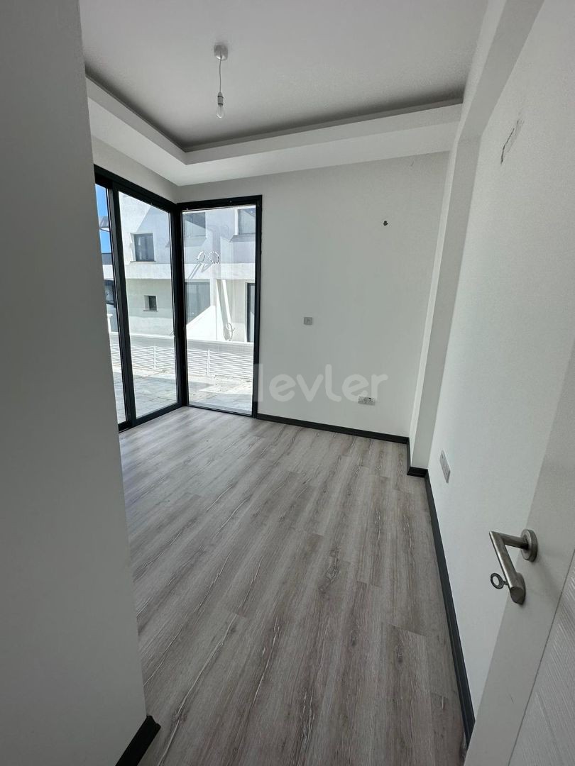 2+1 apartment with garden for sale in Ozanköy