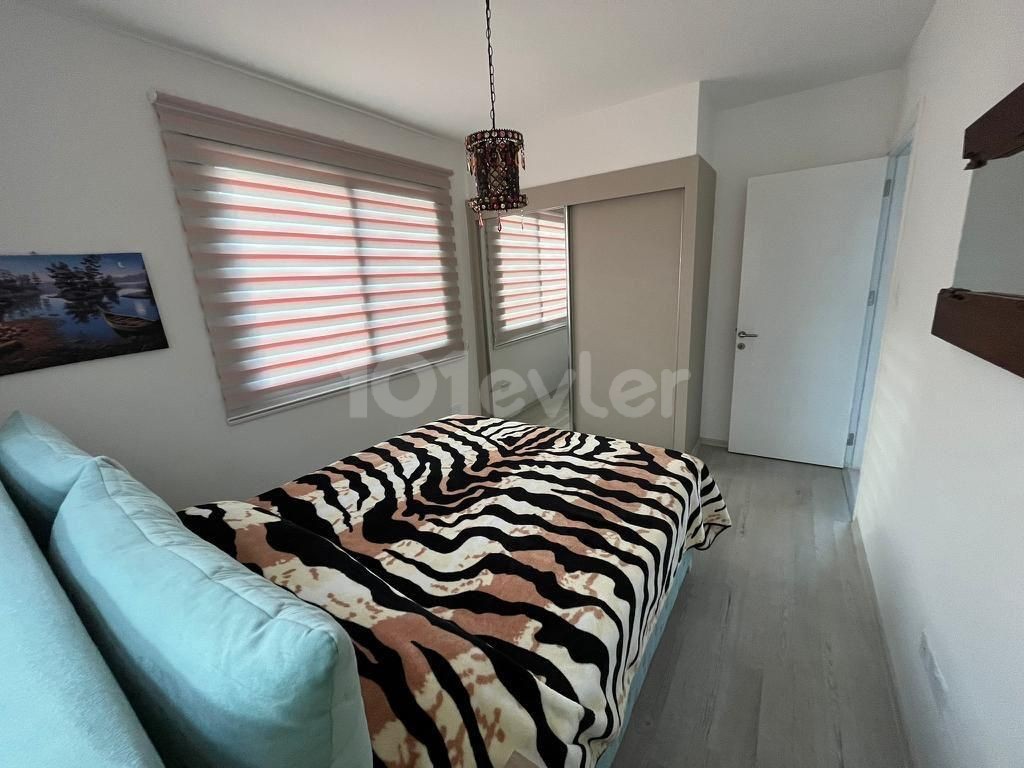 2+1 apartment with garden for sale in Alsancak