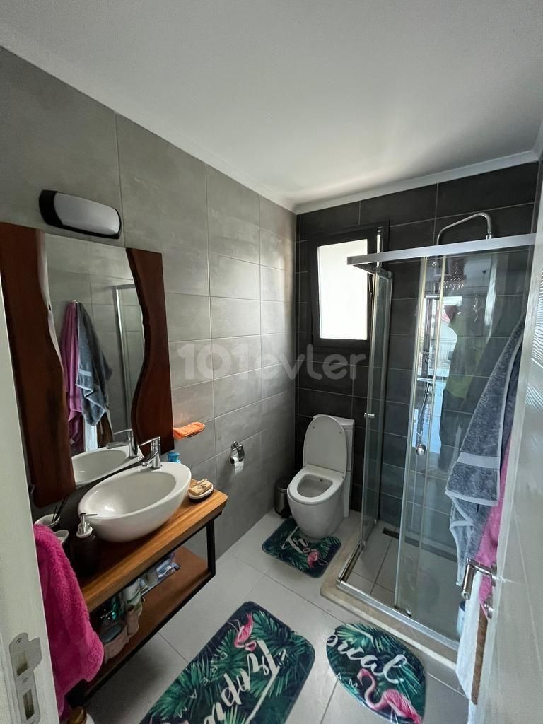 2+1 apartment with garden for sale in Alsancak