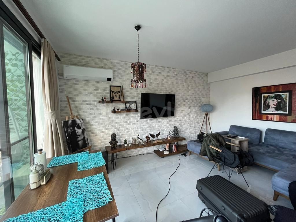 2+1 apartment with garden for sale in Alsancak