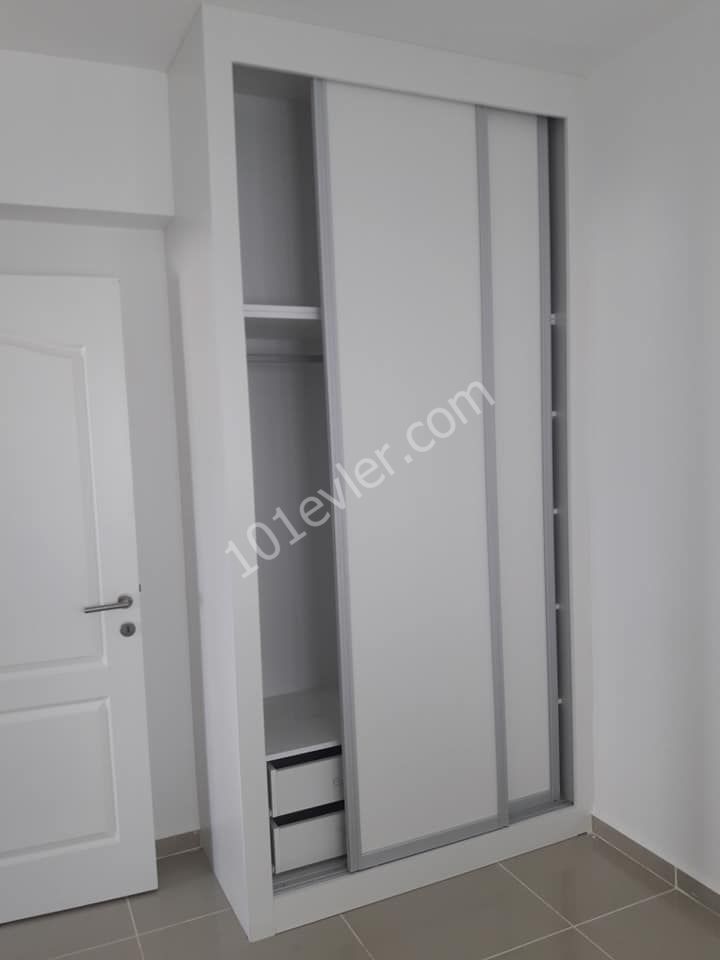 NEUE WOHNUNG ZUM VERKAUF IN YENIBOZICI FÜR INFORMATIONEN:05338867072 ** 