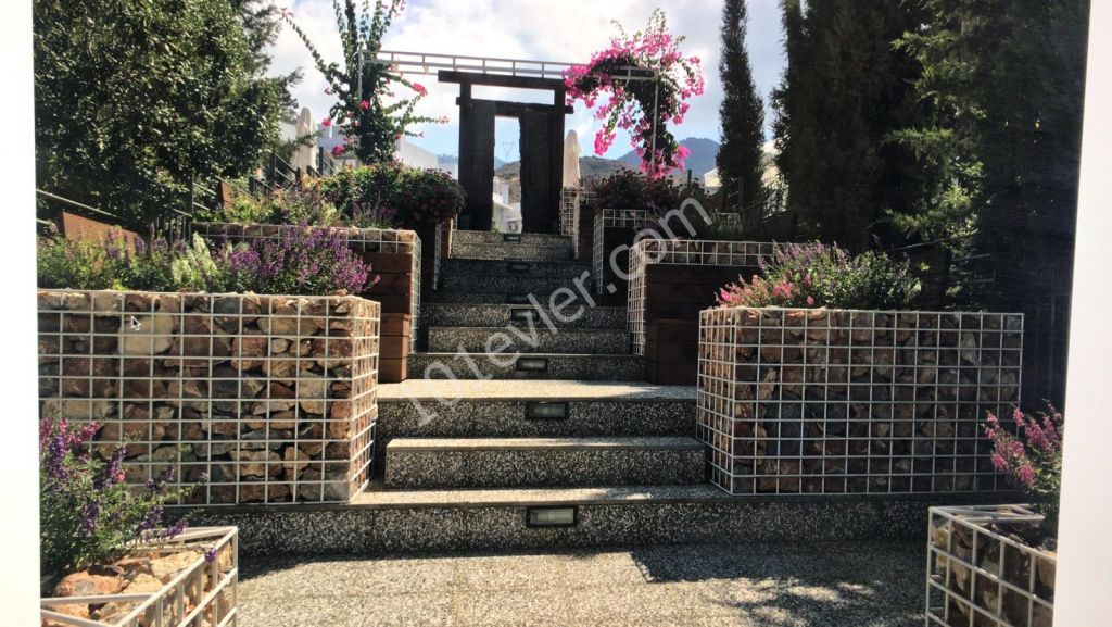 2 + 1 DETACHED HOUSE WITH POOL IN A DECENT PROJECT IN KYRENIA ALSANCAK ( rental yield of 450 pounds) ** 