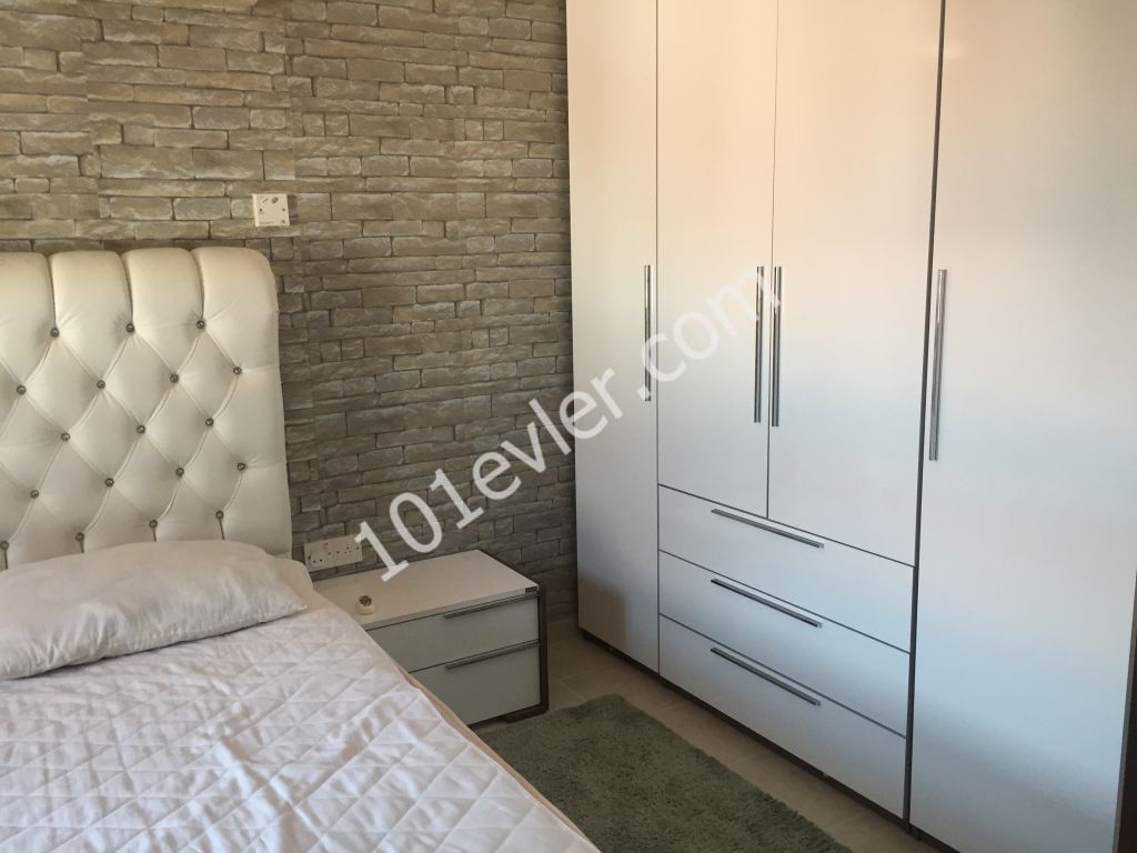 2+1 Apartment on the first floor in Kyrenia, Ozanköy village with communal swimming pool , maintenance inculded