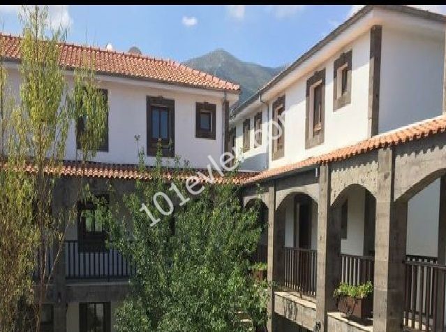 2+1 Apartment on the first floor in Kyrenia, Ozanköy village with communal swimming pool , maintenance inculded