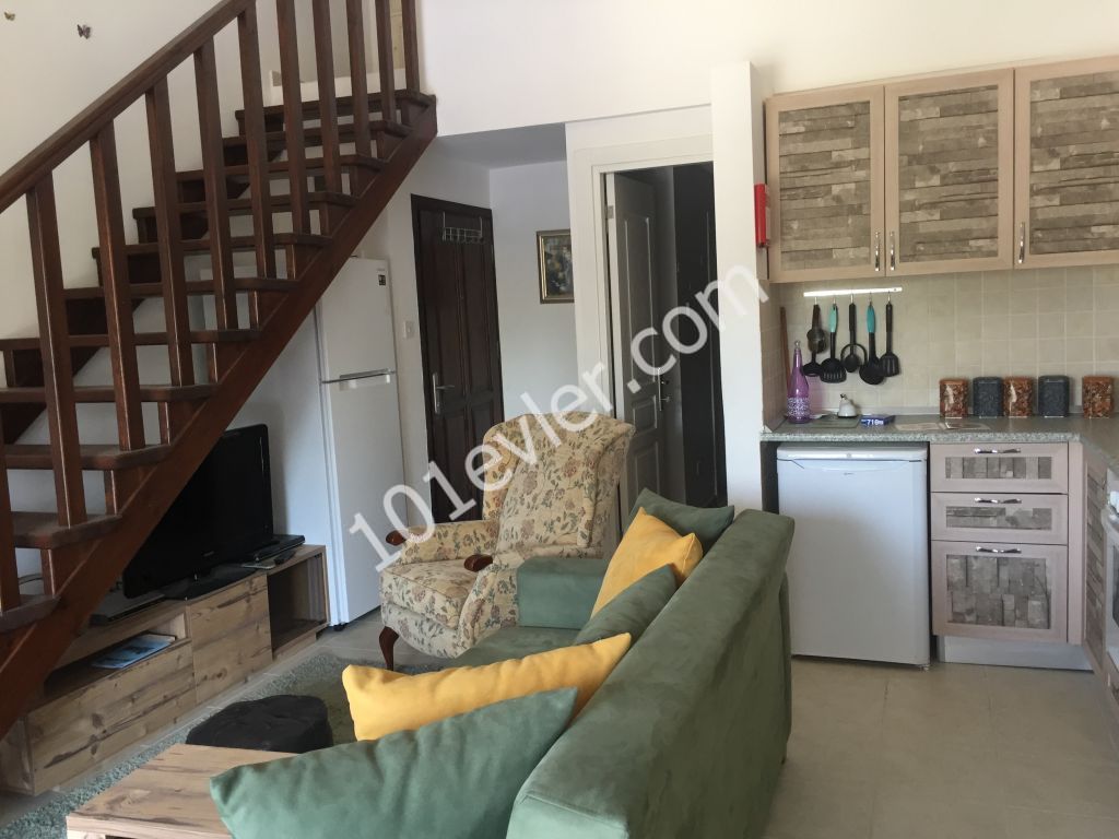 2+1 Apartment on the first floor in Kyrenia, Ozanköy village with communal swimming pool , maintenance inculded