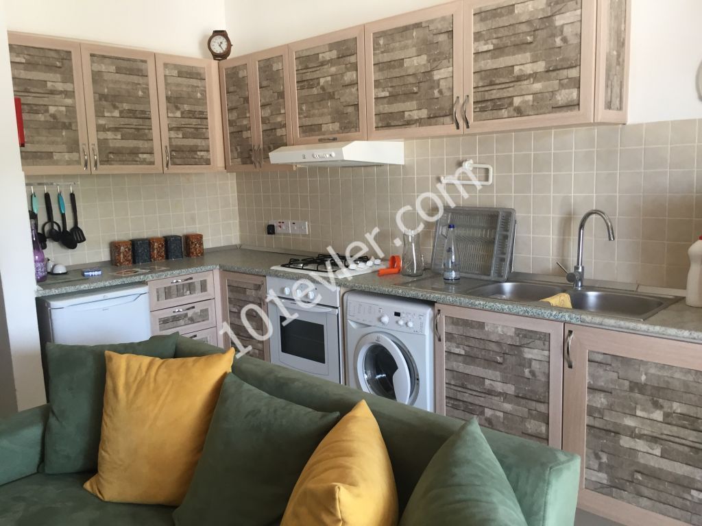 2+1 Apartment on the first floor in Kyrenia, Ozanköy village with communal swimming pool , maintenance inculded