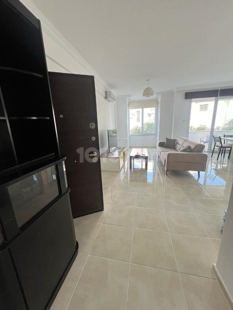 IN ALSANCAK 1+1 FULLY FURNISHED NEW APT WITH WIDE BALKONY AND COMMON SWIMMING POOL