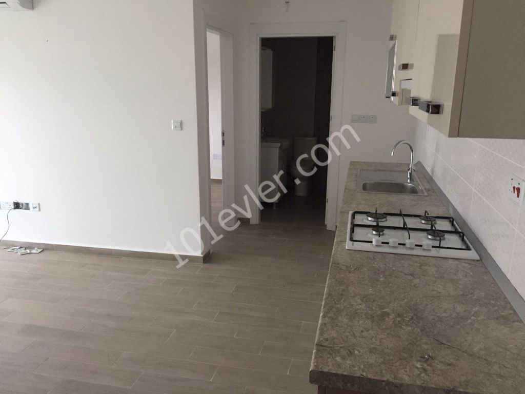 GİRNE MERKEZDE 1+1 YENİ EŞYALI KİRALIK DAİRE