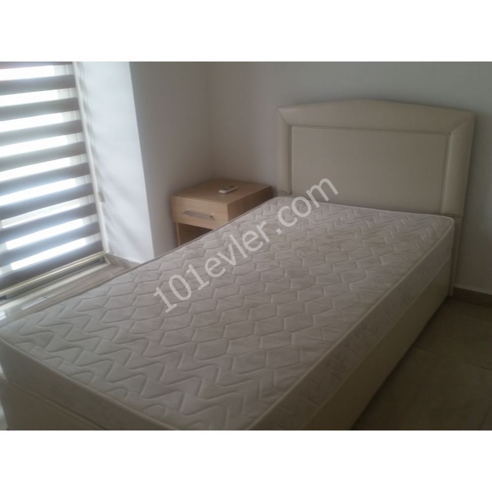 OZANKÖYDE HAVUZLU SİTEDE EŞYALI MODERN DAİRE