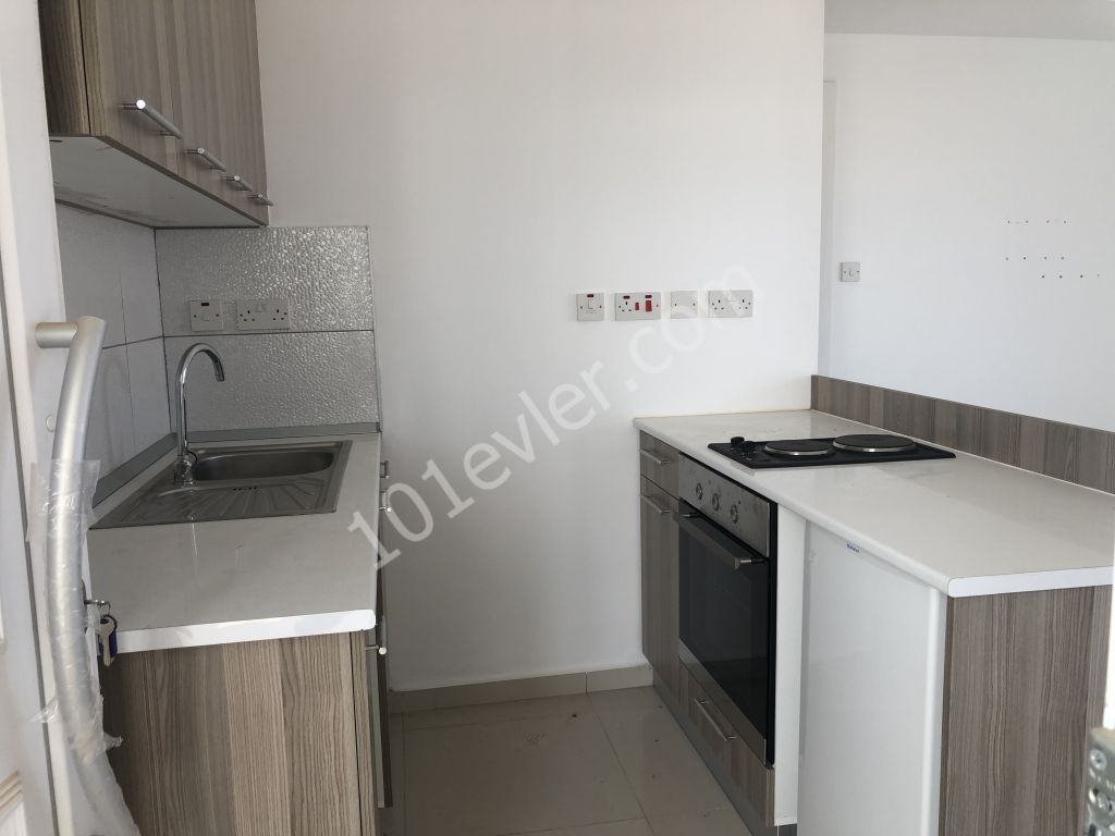 Elexus otel karşısında havuzlu site içerisinde 1+1 satılık daire