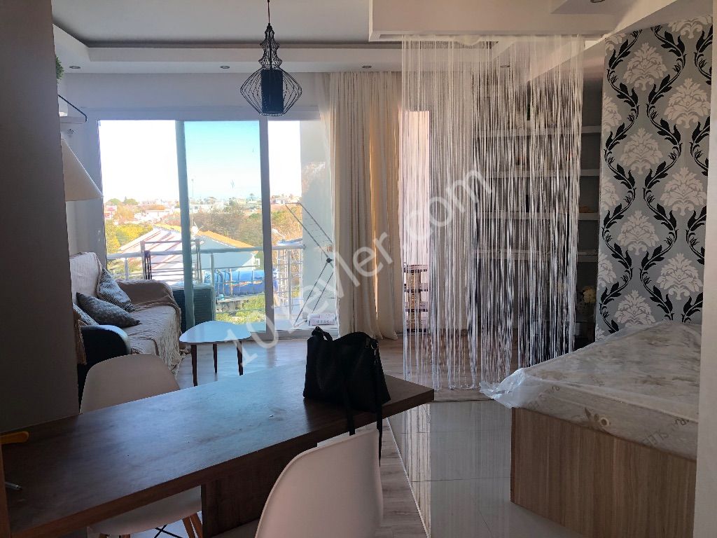 Studio apartment for sale on a site with a luxuriously furnished communal pool in the central location of Alsancakta ** 