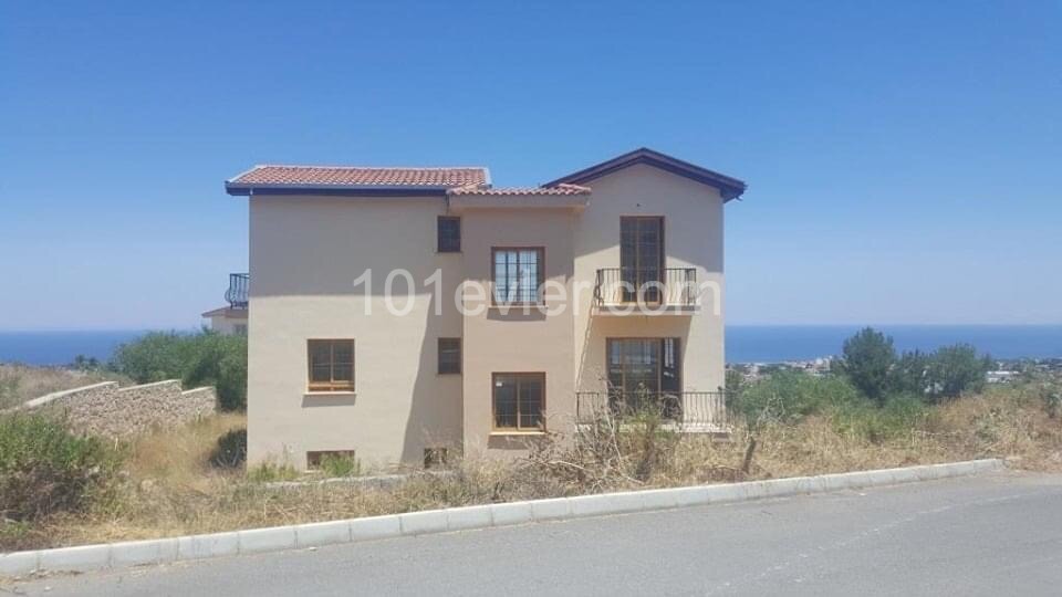 4 + 1 villas for sale in Çatalköy with an equivalent title deed of 80% completed in 1.5 acres of land with excellent sea views ** 